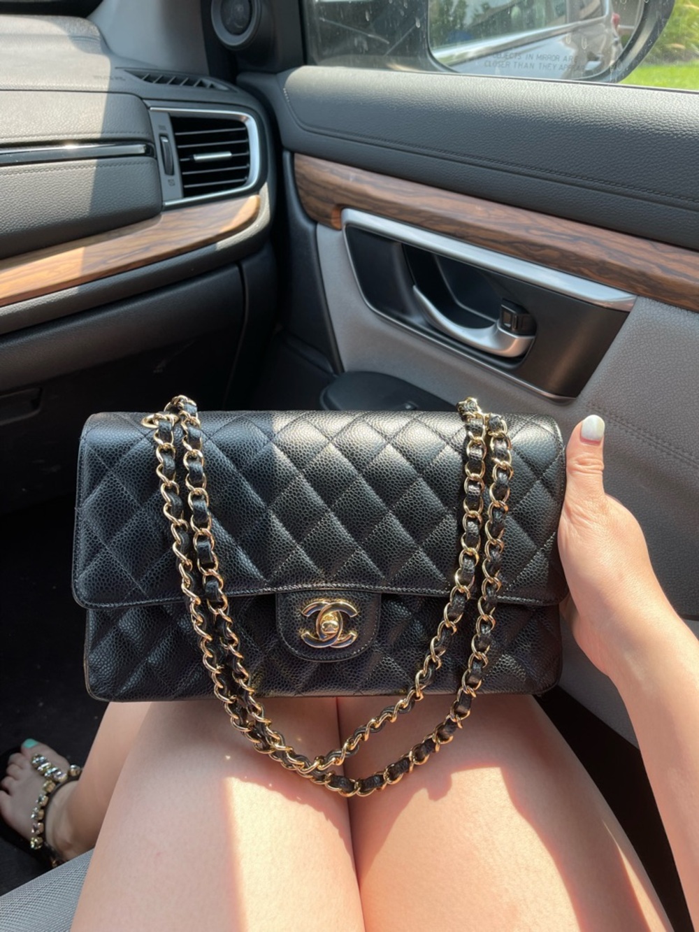 Chanel Classic Quilted Double Flap Bag in Black with Gold hardware